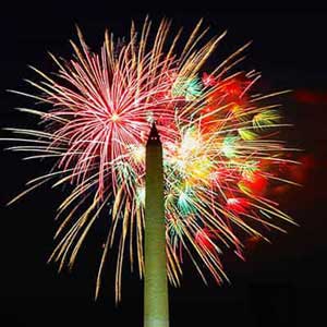 Fireworks behind the Washington Monument at the National Mall in Washington DC